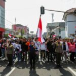 Kepala Desa Rawabogo Pimpin Upacara HUT RI Ke-79 Di Halaman Kantor Desa